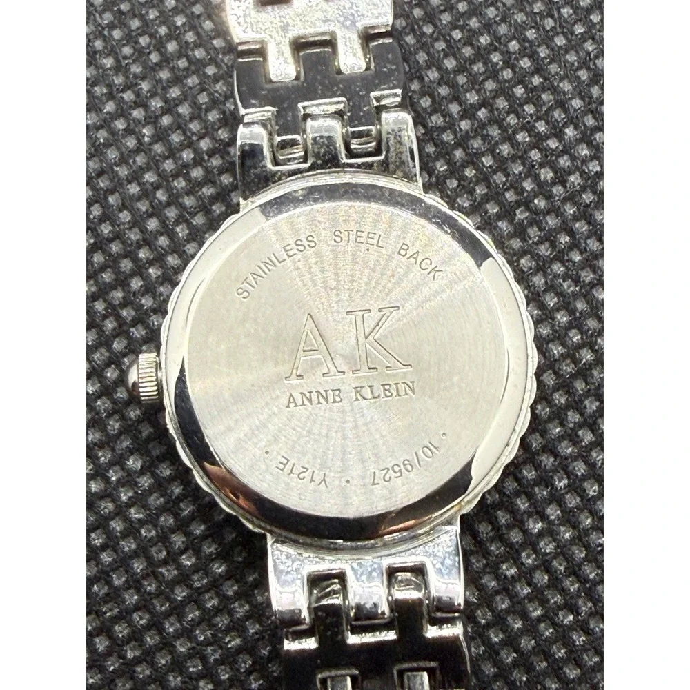 Anne Klein Womens Silver Tone Crystal Bezel Mother of Pearl Watch Needs Battery
